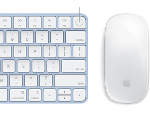 Nahaufnahme von Magic Keyboard und Magic Mouse in passenden Farben mit Fokus auf dem Touch ID Fingerabdruck